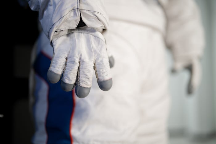 The new AxEMU custom glove design will enable astronauts to work with specialized tools to accomplish exploration needs and expand scientific opportunities.