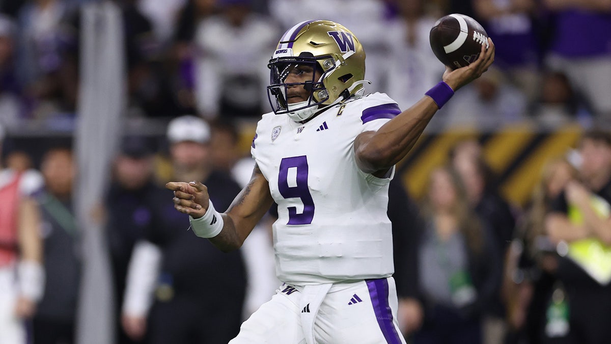 Michael Penix Jr. throws ball