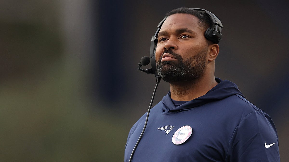 Jerod Mayo looks on during a game against the Commanders