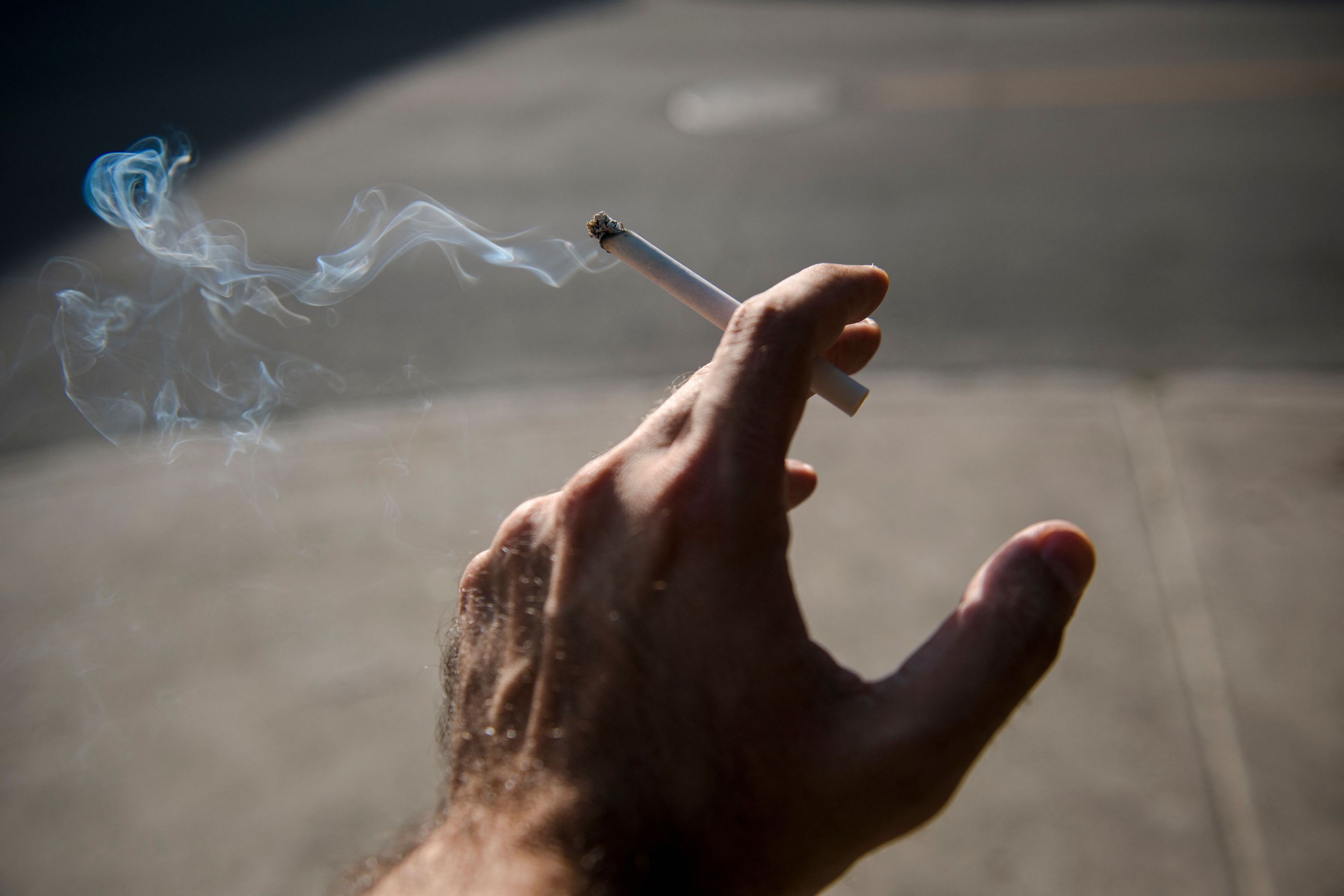 Canadian man smoking cigarette