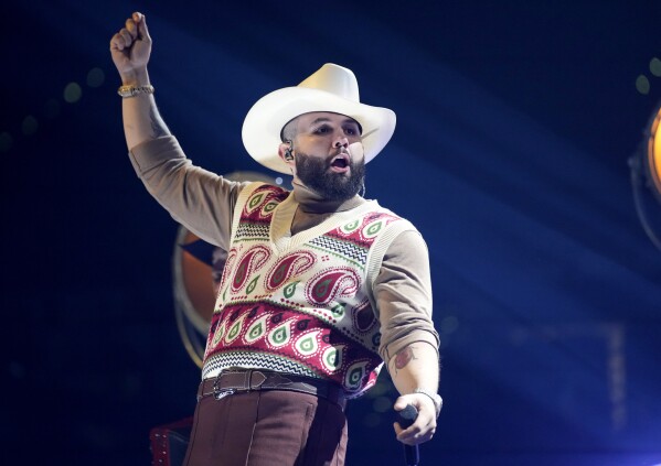 FILE - Carin Leon performs at the Latin American Music Awards on Thursday, April 20, 2023, at the MGM Grand Garden Arena in Las Vegas. Regional Mexican music has become a global phenomenon, topping music charts, breaking streaming records and reaching new audiences as it crosses borders. (AP Photo/John Locher, File)