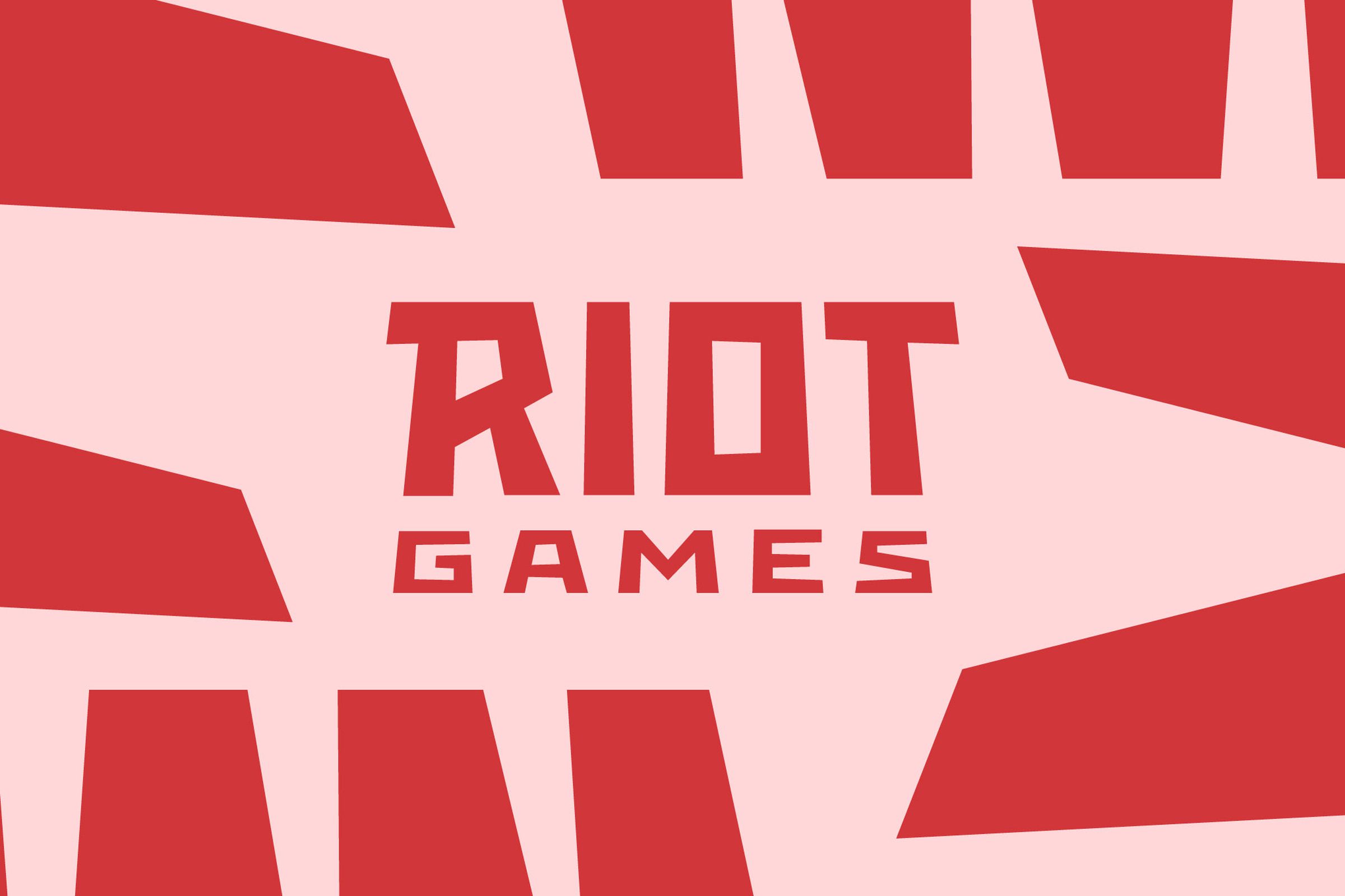 The Riot Games logo on a pink background, surrounded by red blocky shapes.