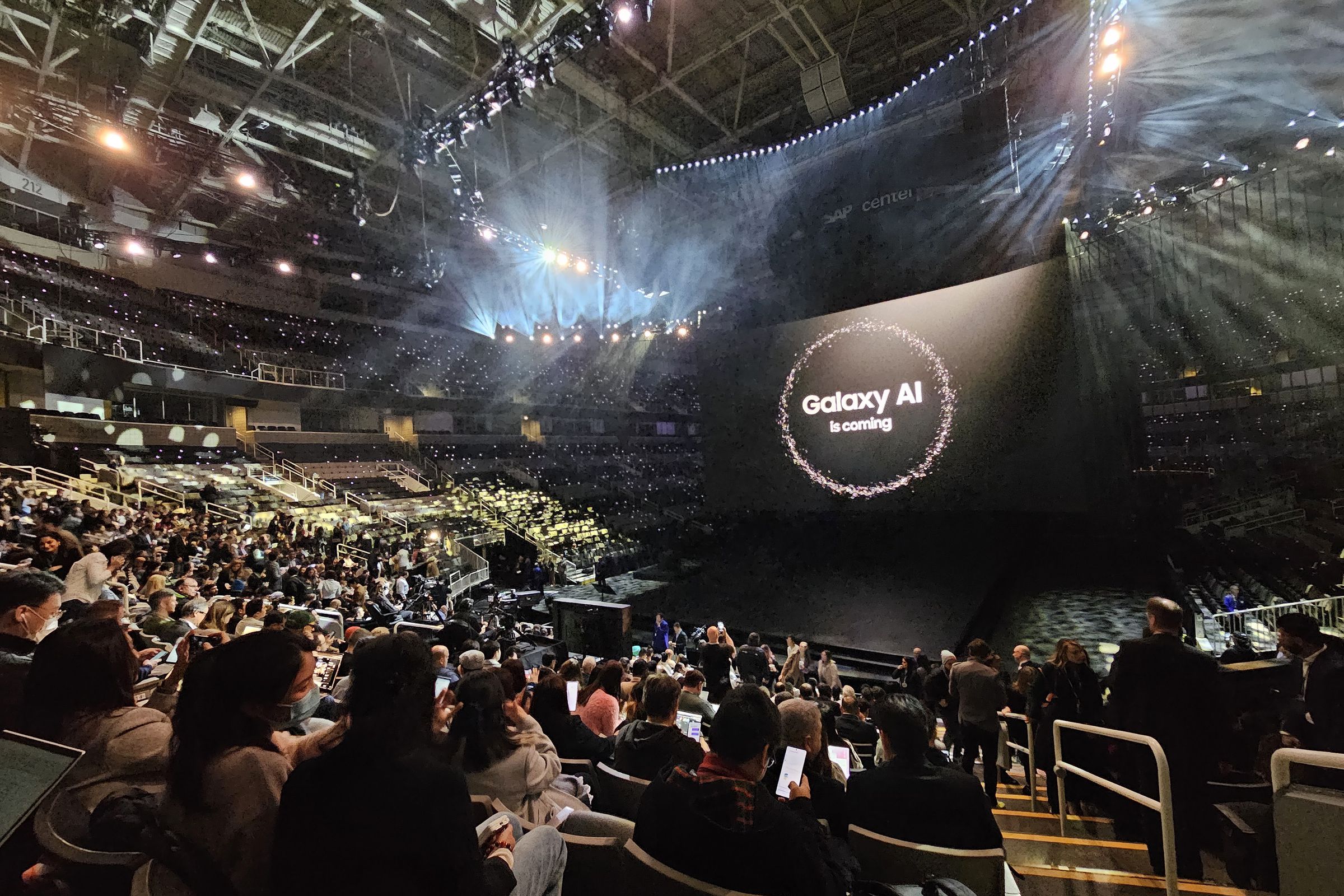 Image of arena with Unpacked presentation on screen.