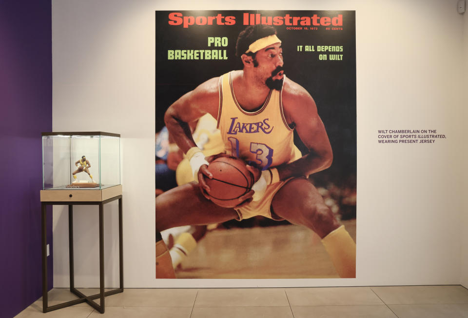 LOS ANGELES, CALIFORNIA - AUGUST 01: October 16, 1972 Sports Illustrated cover and signed limited edition Wilt Chamberlain sports porcelain figurine on display during the press preview at Sotheby's Auction House on August 01, 2023 in Los Angeles, California. (Photo by Rodin Eckenroth/Getty Images)