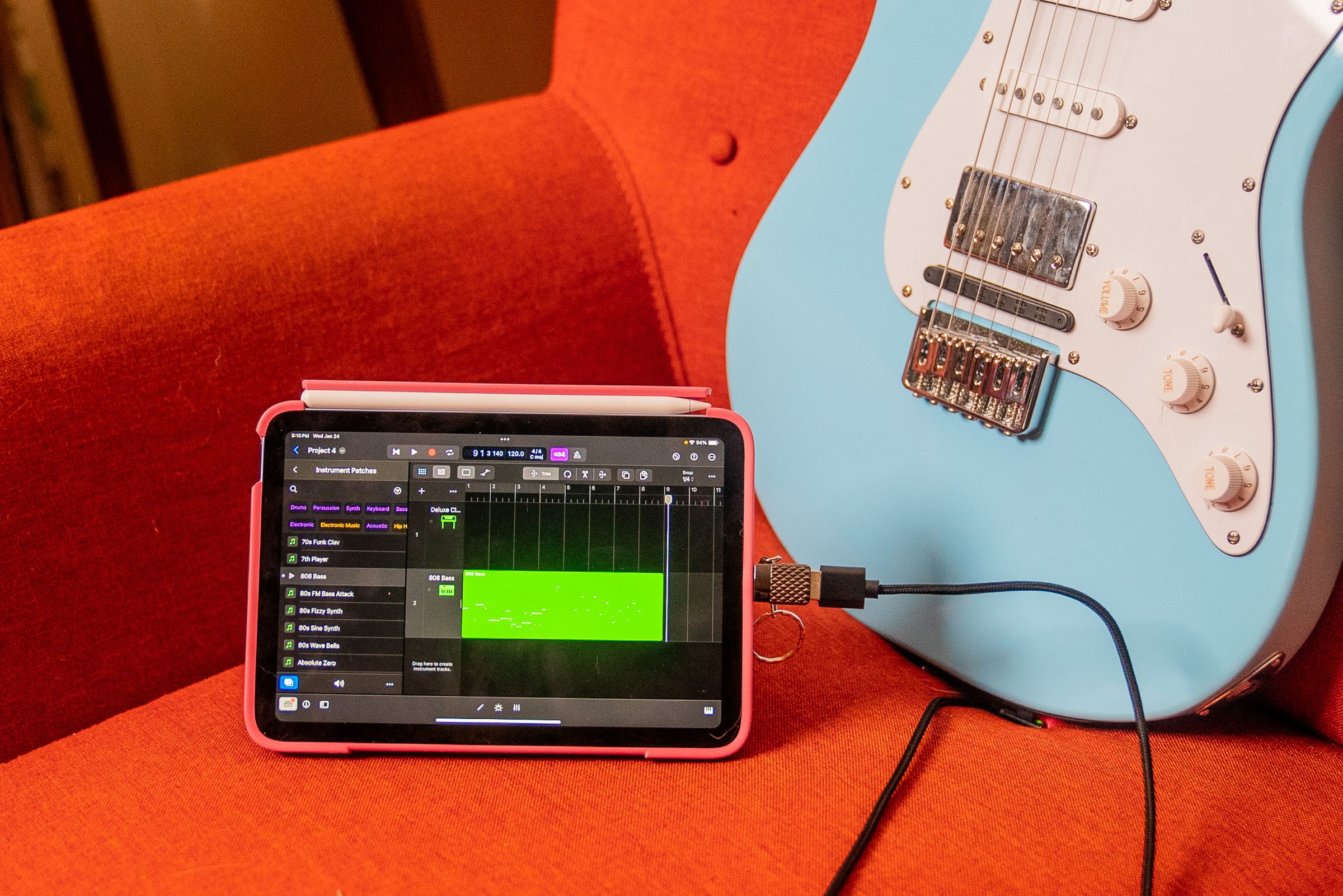 An iPad Mini running Logic for iPad next to the Jamstik Classic.