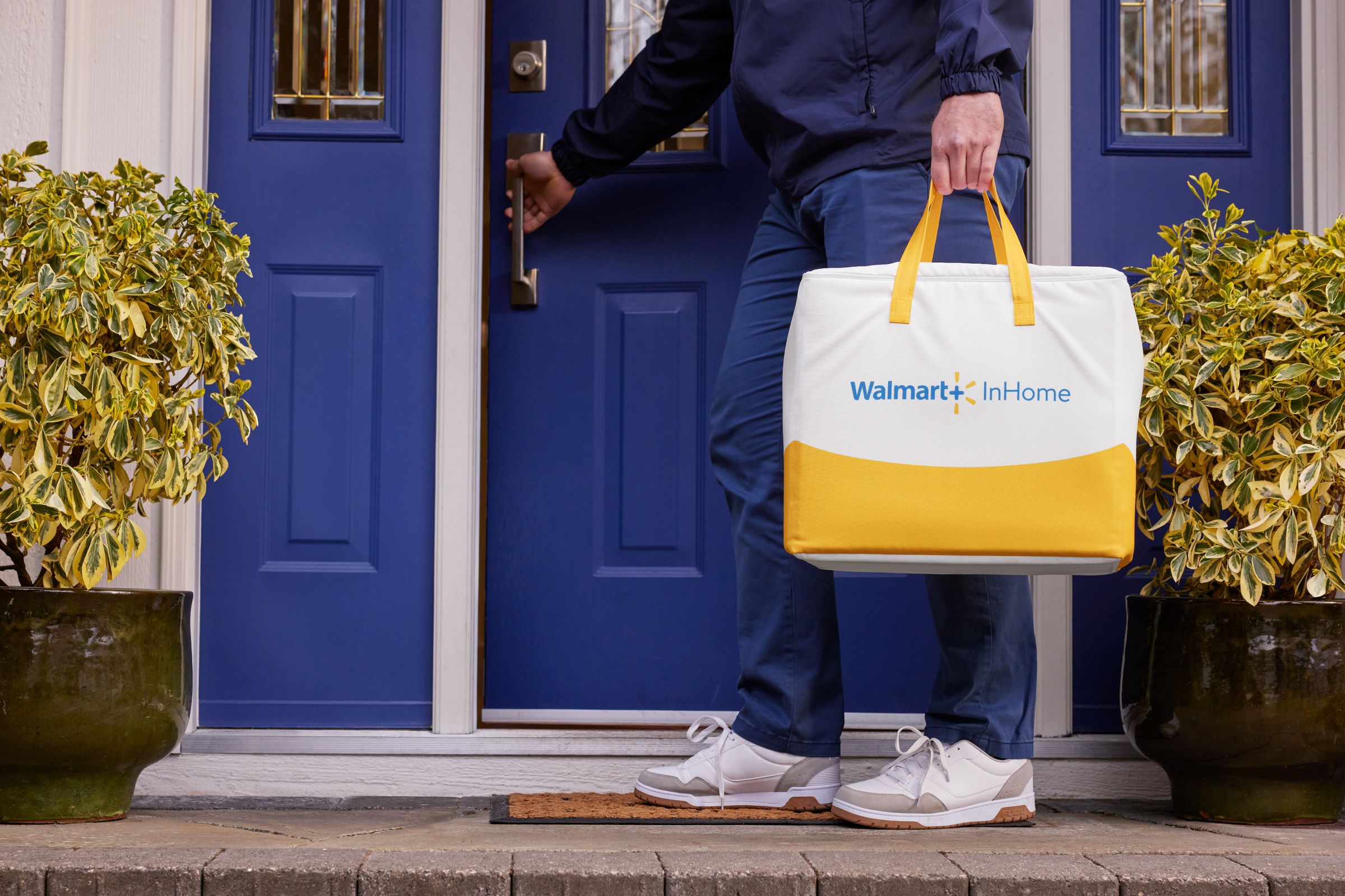 A photo of a Walmart delivery bag on a doorstep.