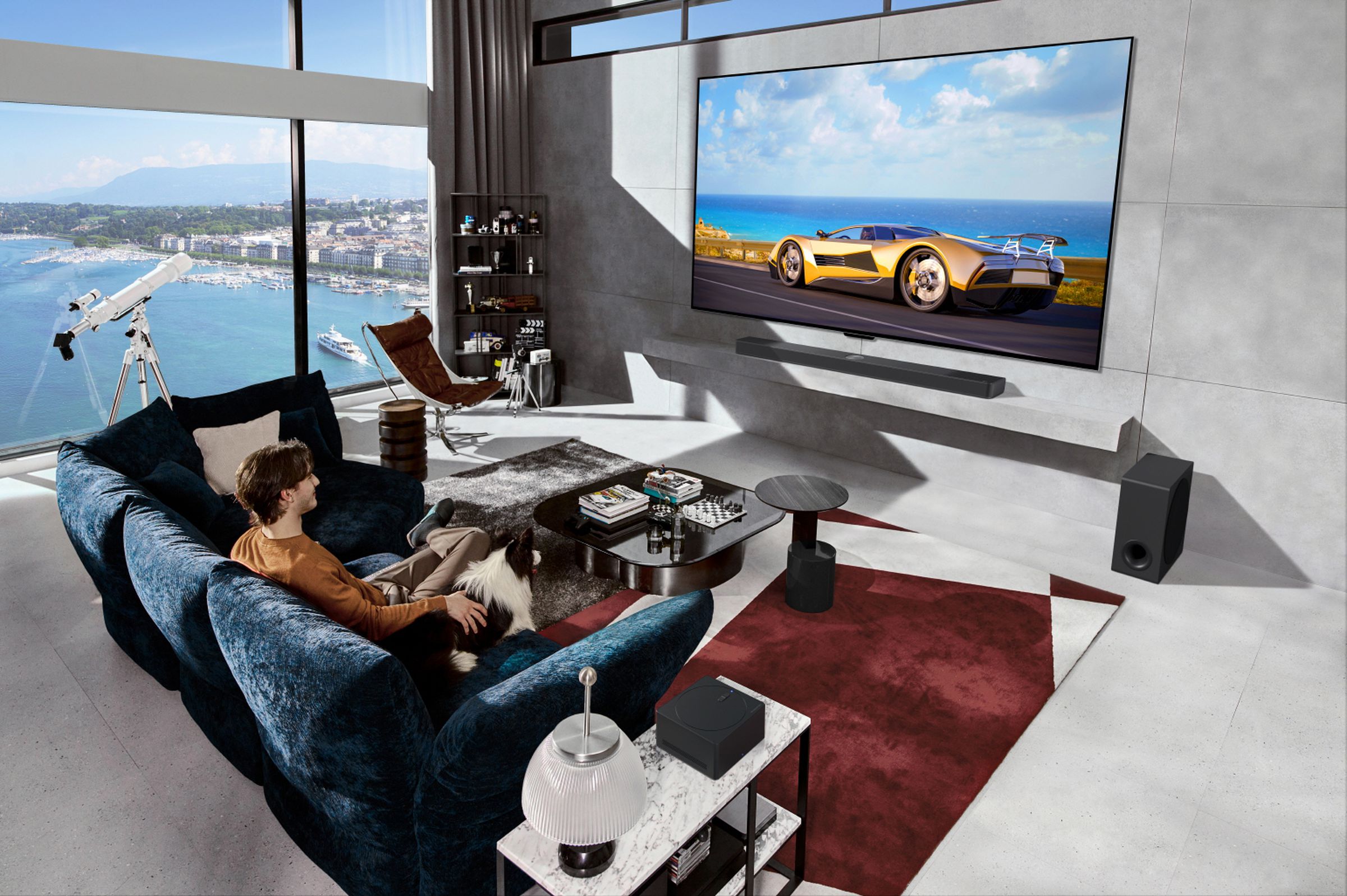 A photo of a man on a couch watching a TV. The room looks brutalist and looks out over a body of water.