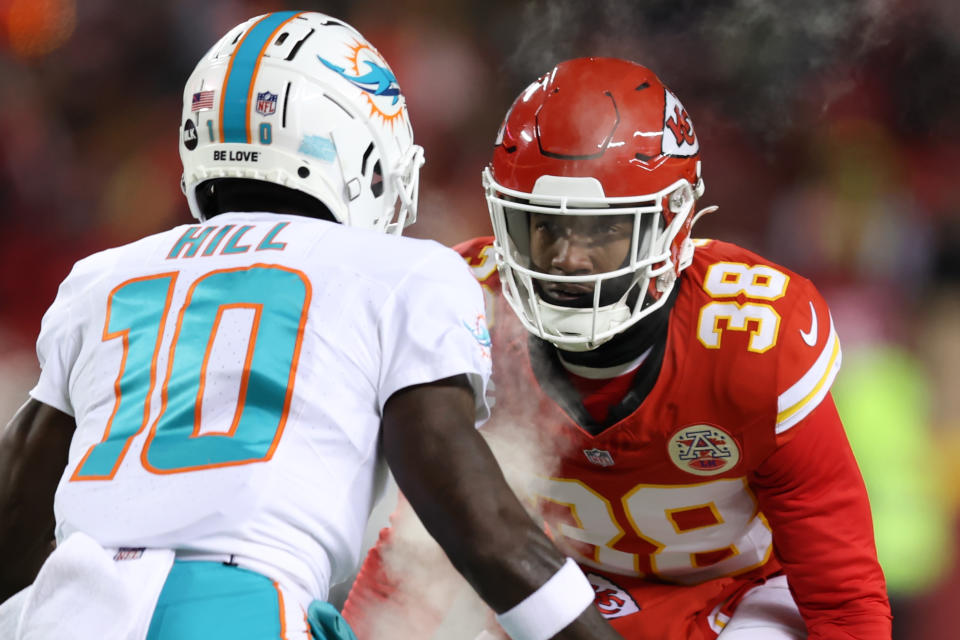 KANSAS CITY, MO - JANUARY 13: Kansas City Chiefs cornerback L'Jarius Sneed (38) guards Miami Dolphins wide receiver Tyreek Hill (10) in the first quarter of an AFC Wild Card playoff game between the Miami Dolphins and Kansas City Chiefs on Jan 13, 2024 at GEHA Field at Arrowhead Stadium in Kansas City, MO. (Photo by Scott Winters/Icon Sportswire via Getty Images)