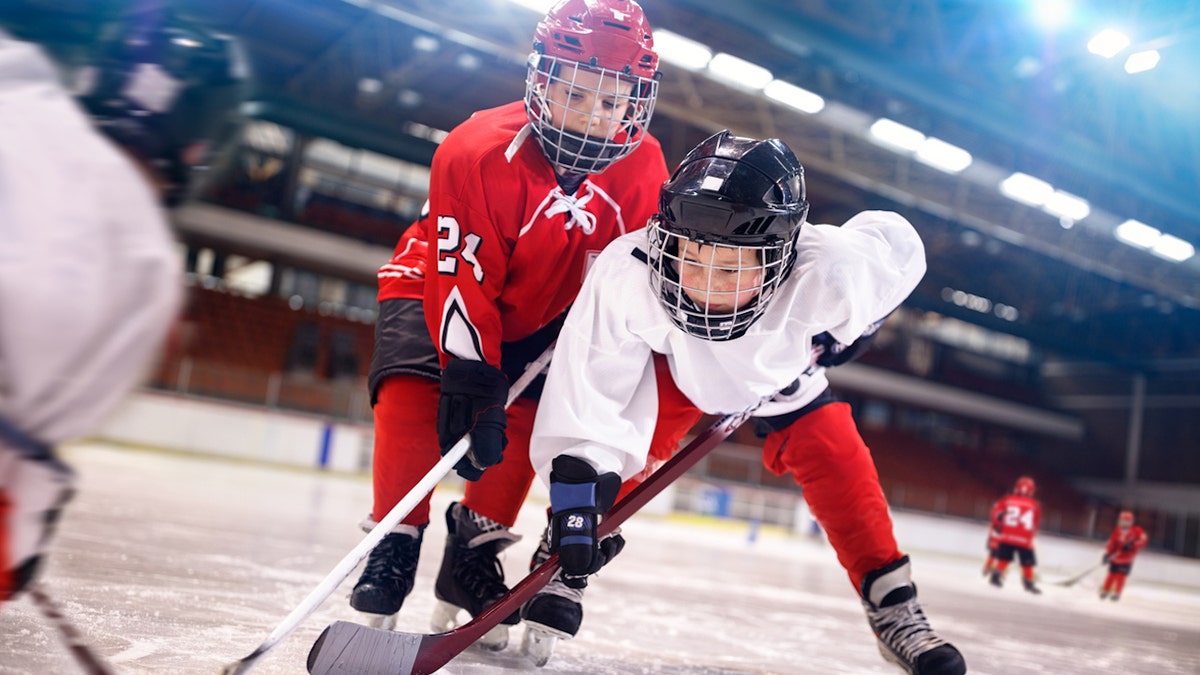 Boys playing hockey