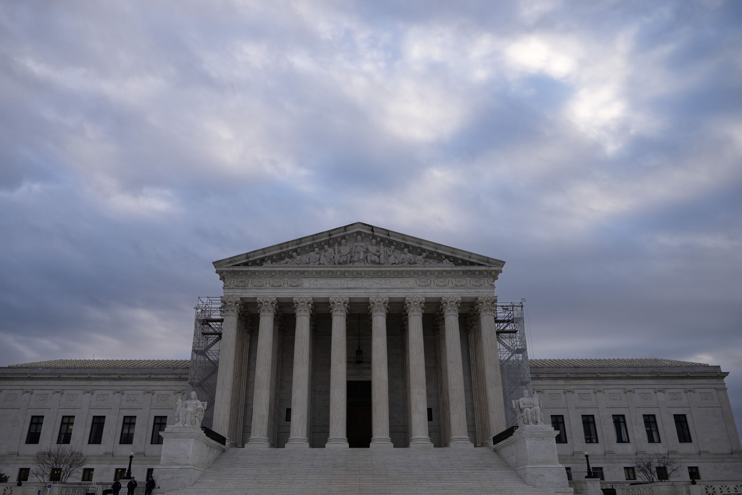 The front of the Supreme Court building, with steps leading up to pillars in front of the entrance.