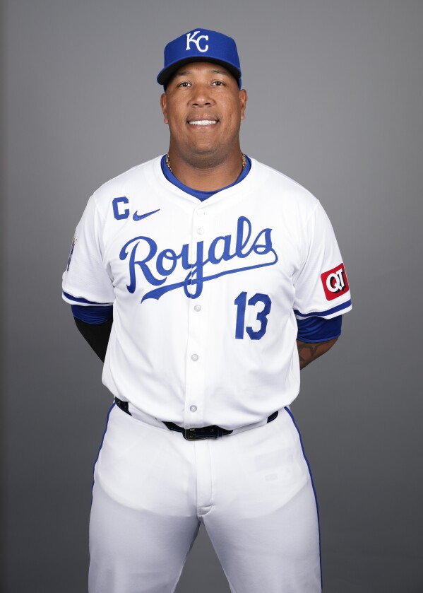 Kansas City Royals catcher Salvador Perez poses for a portrait during a spring training photo day on Thursday, Feb. 22, 2024, in Surprise, Ariz. (AP Photo/Ashley Landis)