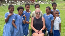 Renee Bruns with local children during a visit to Fiji in November, 2022