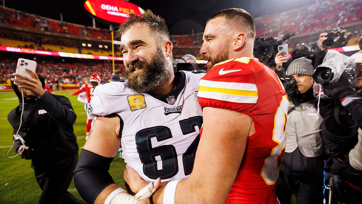 Jason Kelce and Travis Kelce embrace