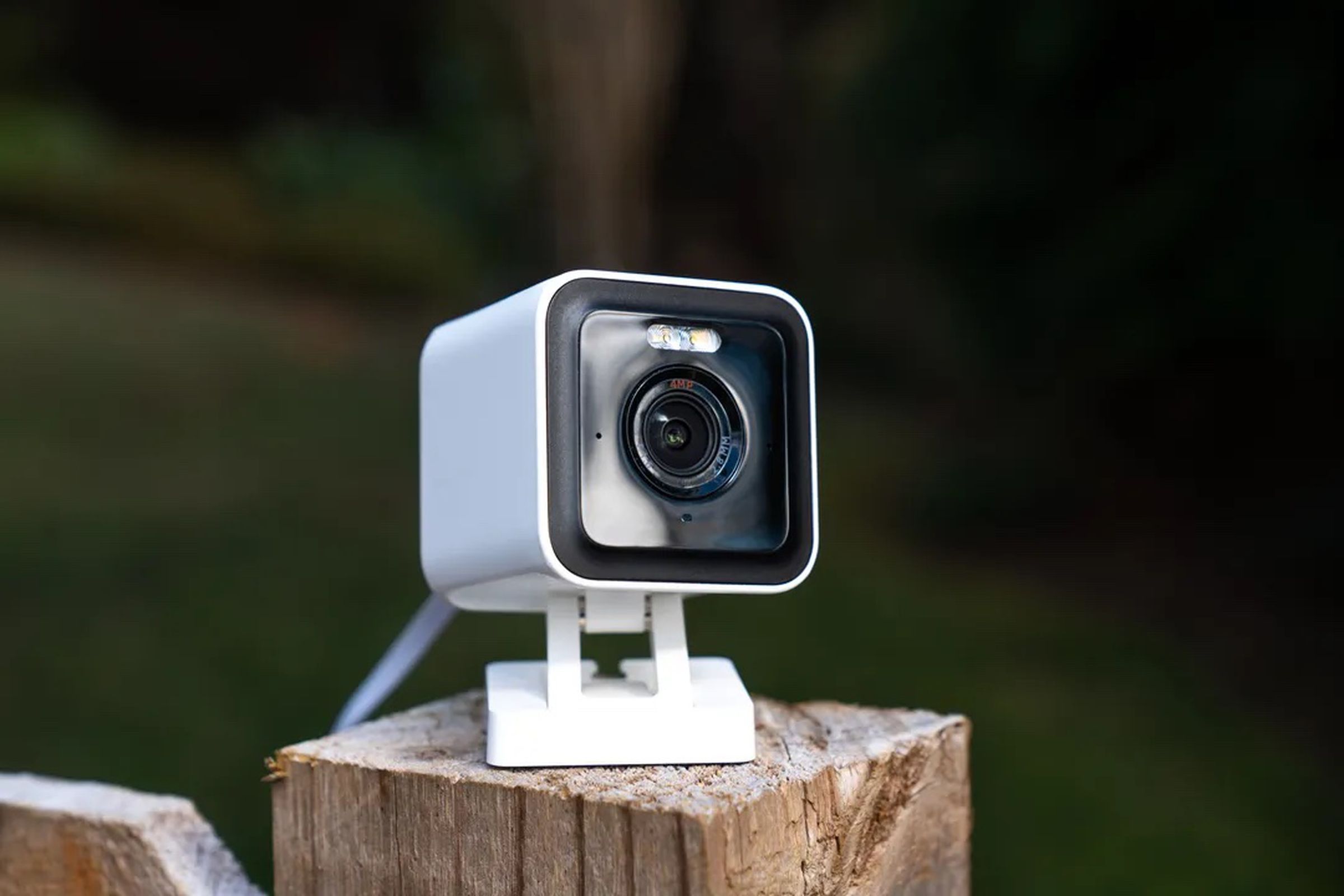 A security camera sites on a ledge.