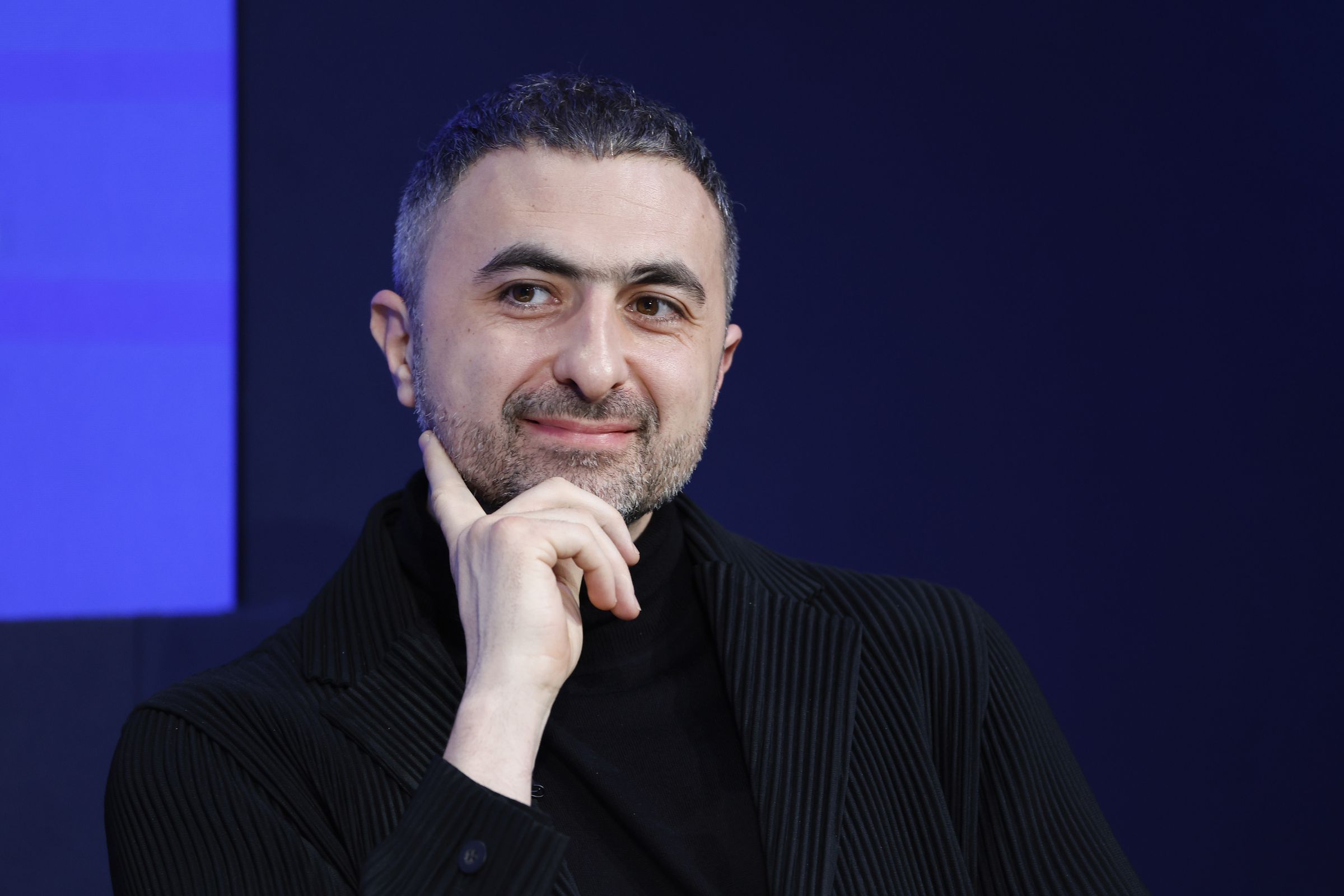 A photo showing Mustafa Suleyman during the World Economic Forum 2024