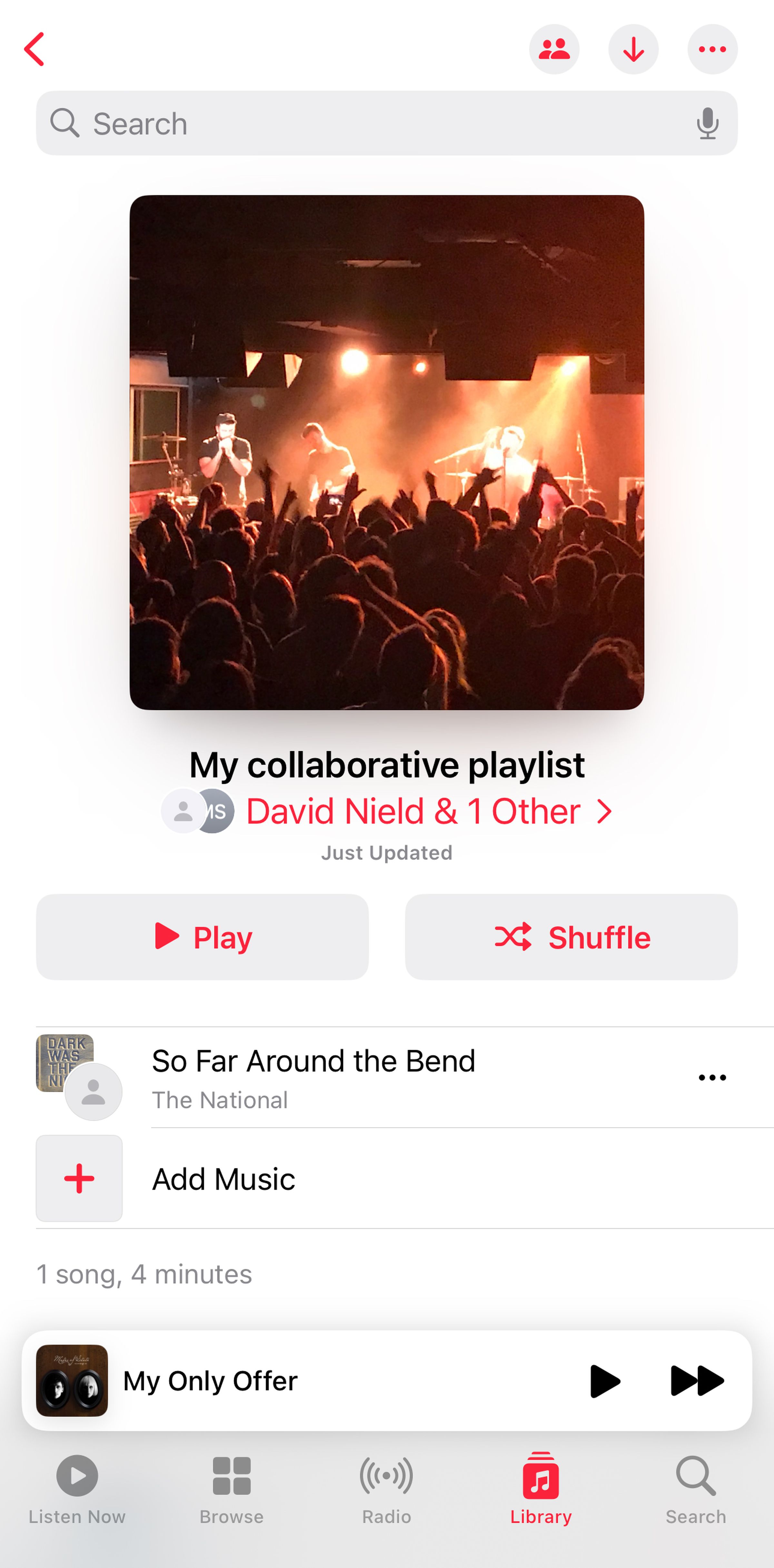 Mobile screen with photo of crowd on top, under that My collaborative playlist David Nield &amp; 1 other, and then a list of songs with a Play and Shuffle button.