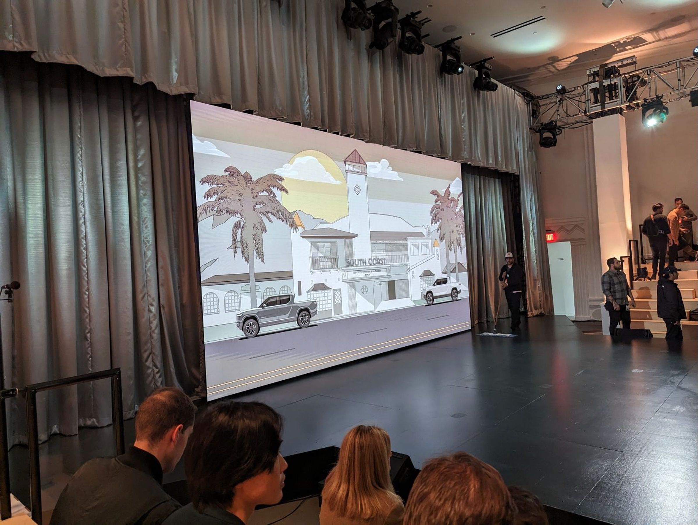 An illustration of the theater with a couple of Rivian R1Ts for good measure. 