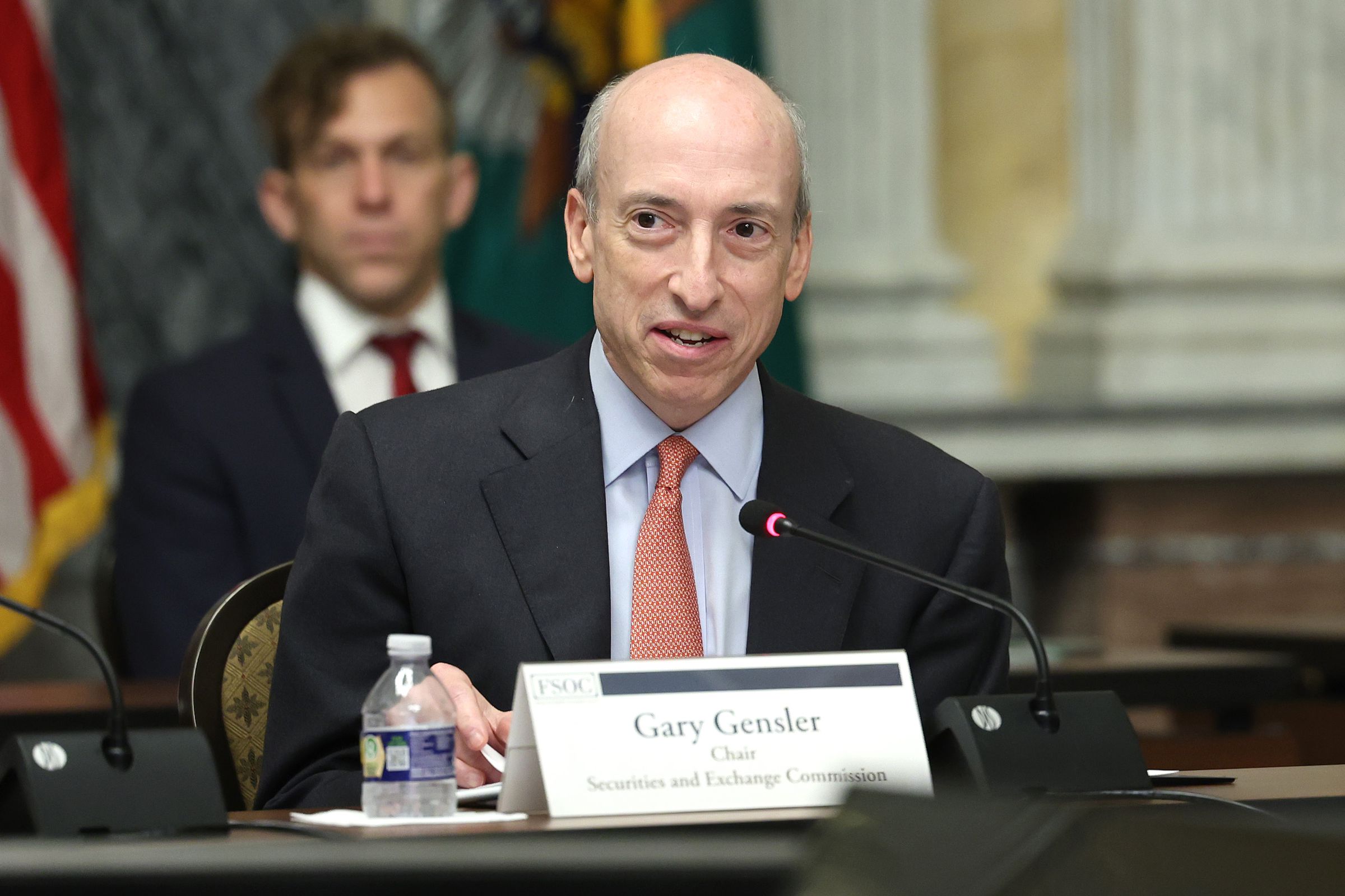 Gary Gensler speaks into a microphone.