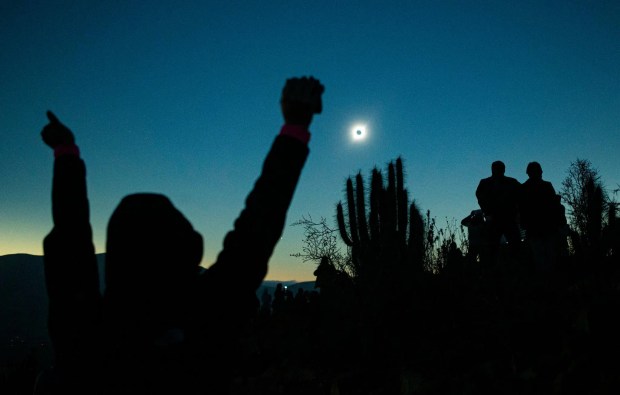 Watching the July 2019 total solar eclipse in Chile.Credit...Victor Ruiz Caballero for The New York Times