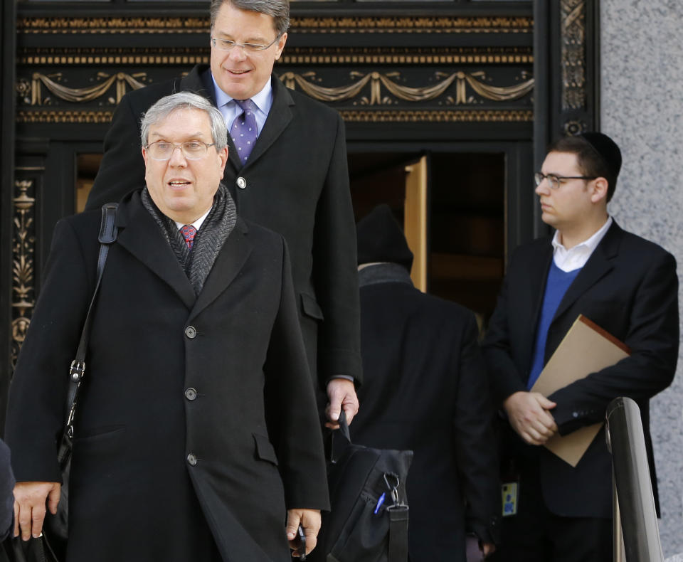 Attorney Jeffrey Kessler, left, who represents New England Patriots quarterback Tom Brady, leaves the 2nd U.S. District Court of Appeals, Thursday, March 3, 2016, in New York, where NFL lawyers asked judges to restore the league's four-game suspension of Brady in connection with the 