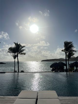 A view of the pool at the Beach House at the Rosewood Le Guanahani resort