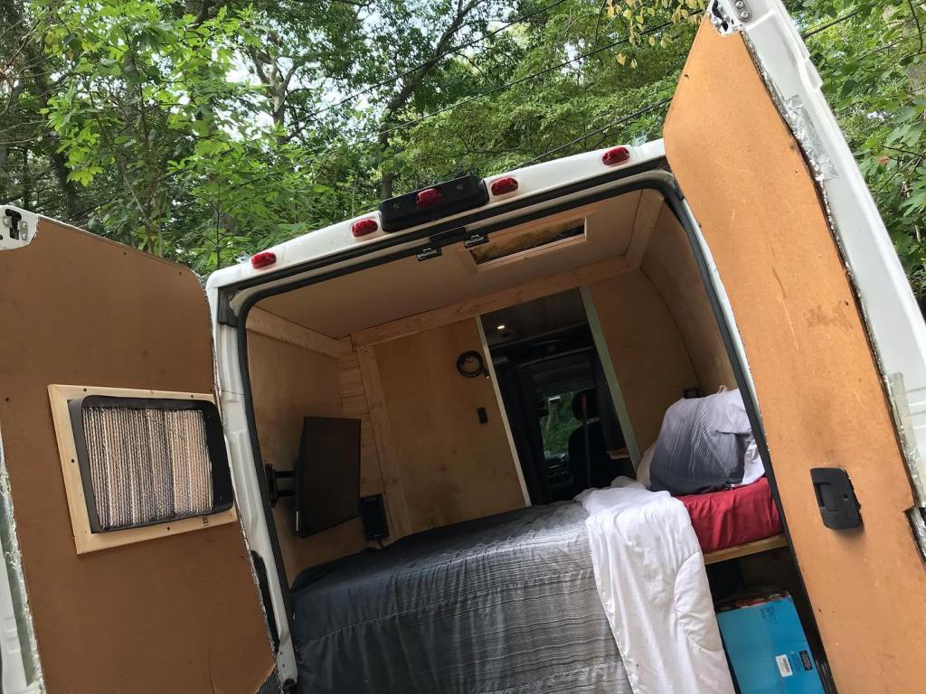 A man who adopted #VanLife after surviving a bout of colon cancer shows off the inside of his Ram ProMaster van.