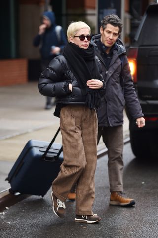 Michelle Williams Wears Chocolate Brown Sneakers