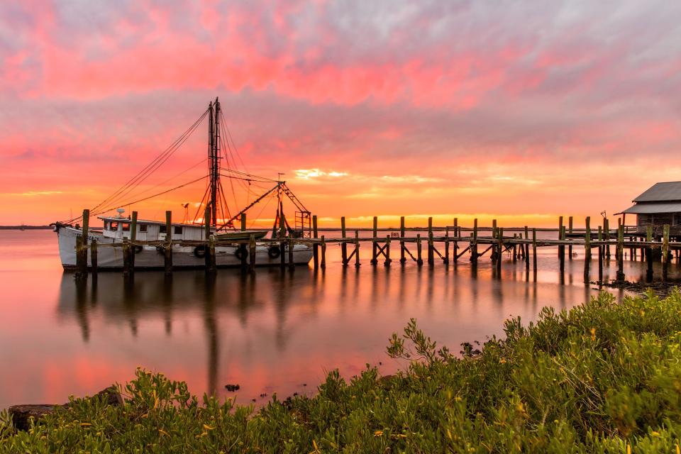 Shrimping boat docked during sunset at Amelia Island.