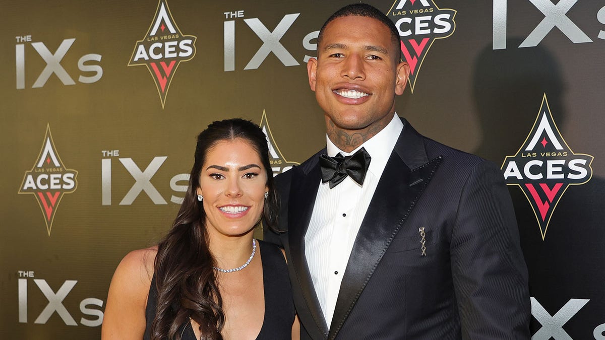 WNBA player Kelsey Plum with Darren Waller