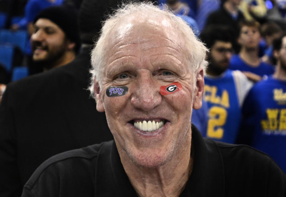 Los Angeles, CA - January 05:  Two-time NBA champion and Hall of Famer Bill Walton has died of cancer at the age of 71. Former UCLA Bruins Bill Walton showing off his CFP Championship teams TCU and Georgia eye black stickers as the UCLA Bruins defeated the USC Trojans 60-58 during a Men's NCAA basketball game at Pauley Pavilion in Los Angeles on Thursday, January 5, 2023. (Photo by Keith Birmingham/MediaNews Group/Pasadena Star-News via Getty Images)