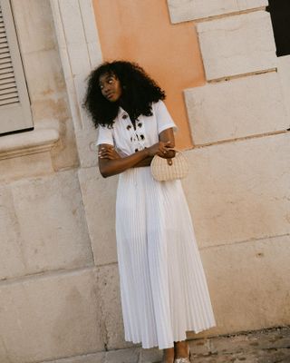 Cabo-inspired vacation outfit, white maxi dress.