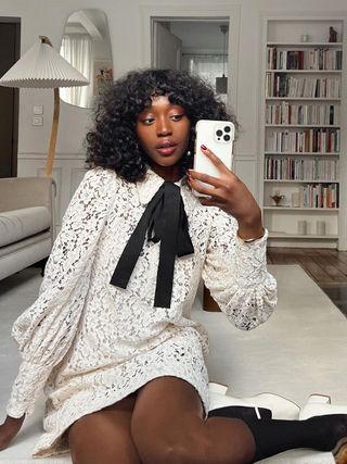 Content creator Emmanuelle Koffi wearing a Zimmermann dress