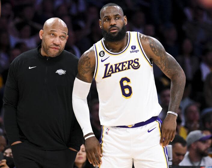 LOS ANGELES, CA - MAY 20: Los Angeles Lakers forward LeBron James, right, talks with head coach Darvin Ham.