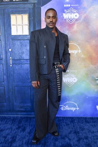 Ncuti Gatwa wears a pinstripe suit at the premiere of the new season of "Doctor Who" at NeueHouse in Hollywood, California