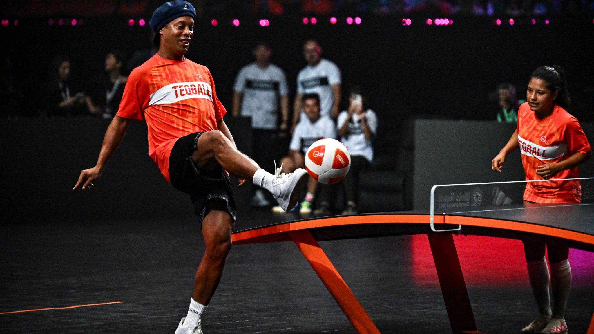 Ronaldinho plays on a teqball table 