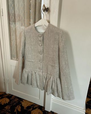 A photo of a linen peplum Liberowe jacket.