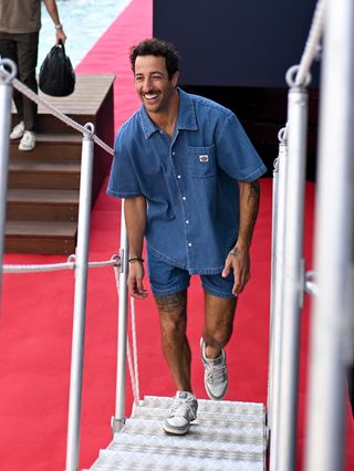 Daniel Ricciardo of Australia and Visa Cash App RB arrives in the Paddock on a tender during previews ahead of the F1 Grand Prix of Monaco at Circuit de Monaco on May 23, 2024 in Monte-Carlo, Monaco.