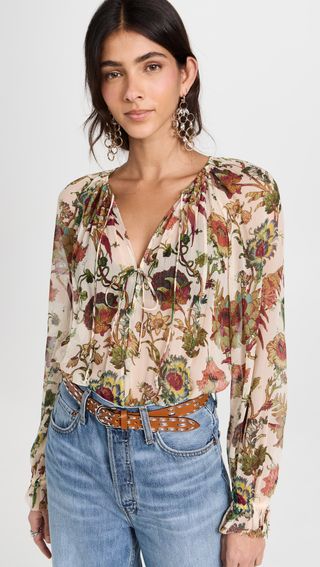 A model wears Ulla Johnson's brown chiffonBernadette Blouse