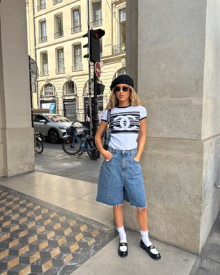 Emili Sindlev wearing a denim shorts outfit