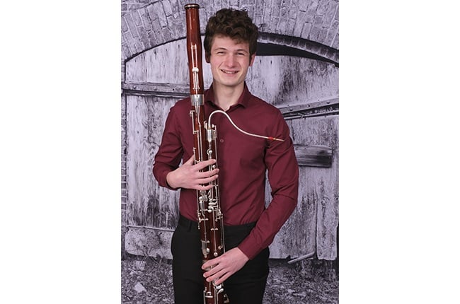 Liam Slabbert from Cape Town, South Africa, plays the bassoon. 