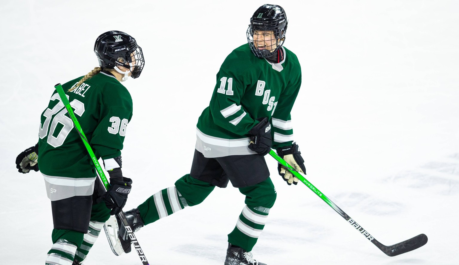 January 27, 2024 Lowell, Massachusetts, USA Boston forward Alina Muller 11 and Boston forward Loren Gabel 36 laugh following a goal during a PWHL regular season game between Boston and Minnesota at Ts ...