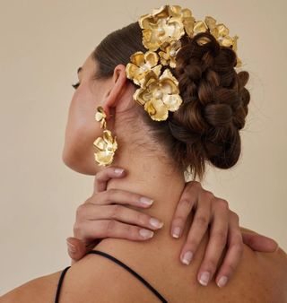 Woman with gold hair accessories