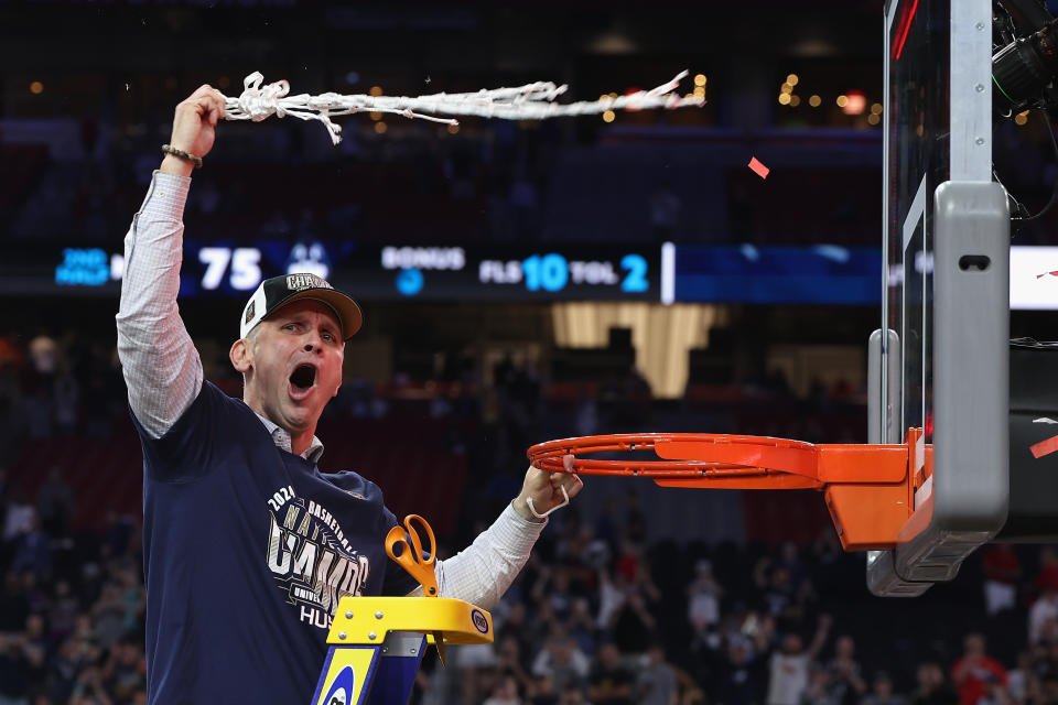 GLENDALE, ARIZONA - APRIL 08: Head coach Dan Hurley of the Connecticut Huskies cuts down the net after beating the Purdue Boilermakers 75-60 to win the NCAA Men's Basketball Tournament National Championship game at State Farm Stadium on April 08, 2024 in Glendale, Arizona. (Photo by Christian Petersen/Getty Images)