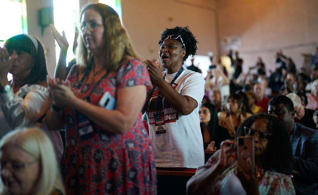 DETROIT, MI - June 15: Attendees applaud as former president Do