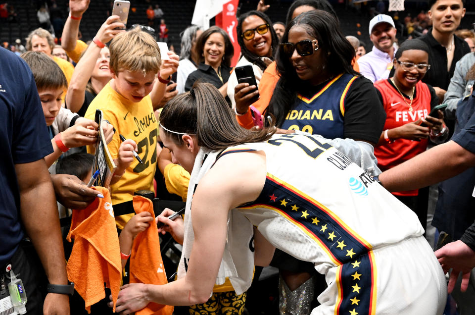 WASHINGTON, DC - JUNE 07: Caitlin Clark #22 of the Indiana Fever signs autographs after the game against the Washington Mystics at Capital One Arena on June 07, 2024 in Washington, DC. NOTE TO USER: User expressly acknowledges and agrees that, by downloading and or using this photograph, User is consenting to the terms and conditions of the Getty Images License Agreement. (Photo by Greg Fiume/Getty Images)