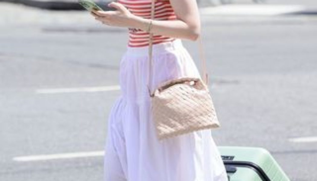 Elle Fanning Wore the Skirt-and-Sandal Combo You're About to See a Lot