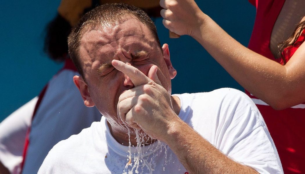 Joey Chestnut banned from 2024 Nathan's hot dog eating contest over partnership with vegan wiener company