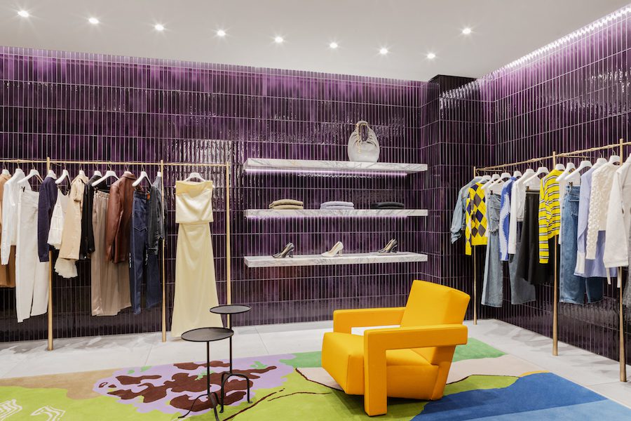 loewe womens wear first store in brazil glazed purple tiles and green rug yellow chair