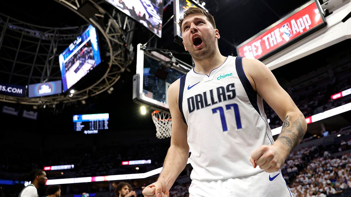 Luka Doncic celebrates