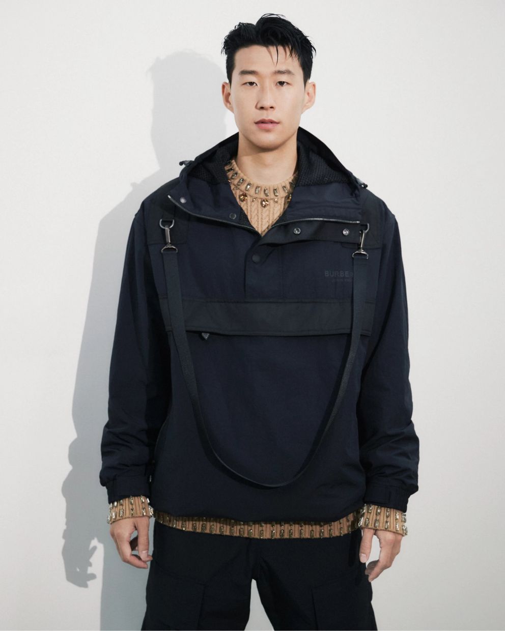 Son Heung-min shows off a winning look, which comprises a contemporary windbreaker style jacket and embellished pullover. Photo: Burberry